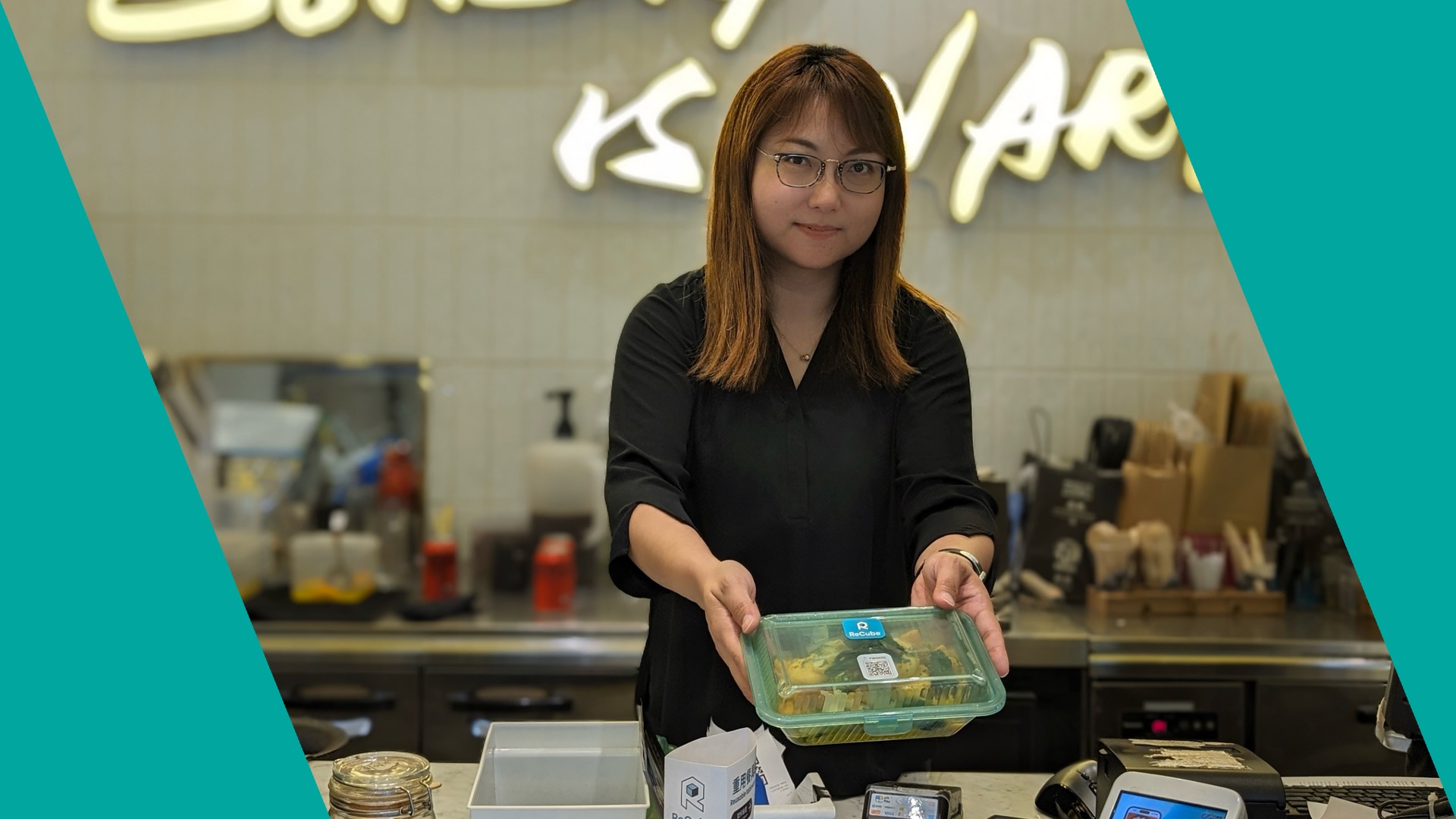 A person holding ReCube Eco-friendly box